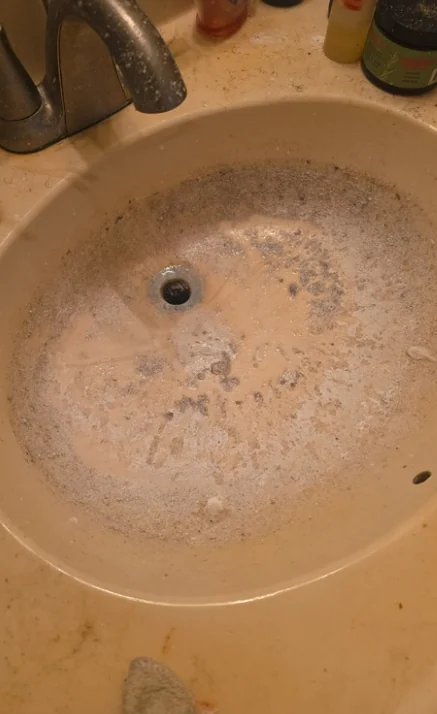Before: Bathroom sink before and after cleaning