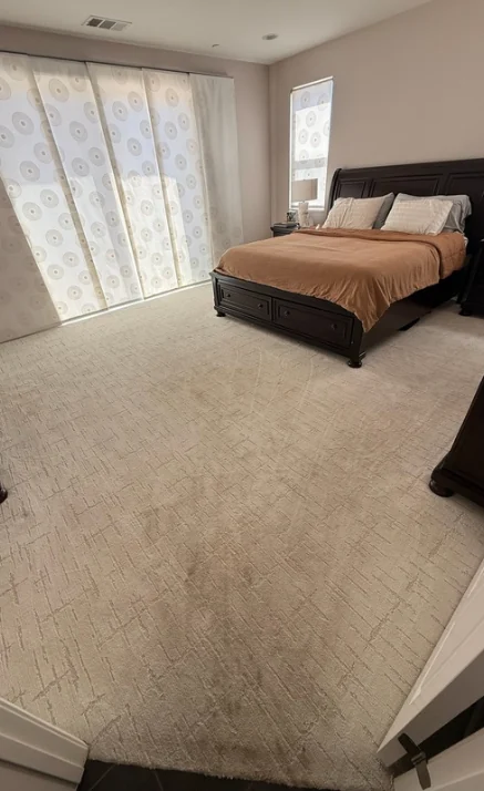 Before: Bedroom carpet before and after cleaning