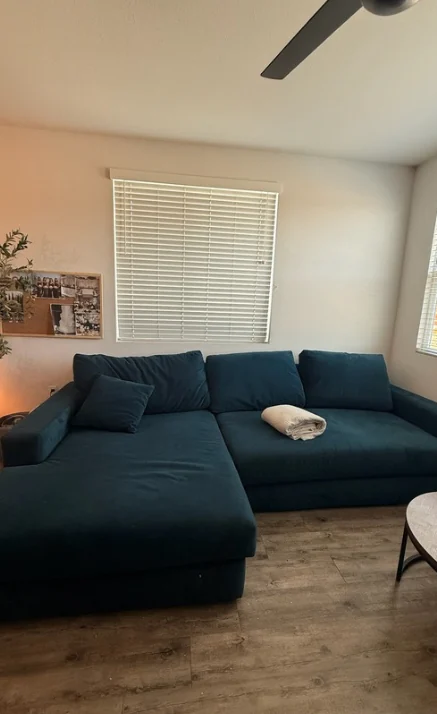 Before: Blue sectional sofa before and after upholstery cleaning