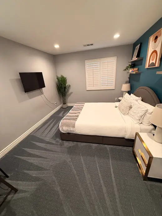 Cleaned carpet in a furnished bedroom
